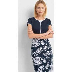 Koszulka z kokardką. T-shirty damskie marki Orsay. Za 69.99 zł.