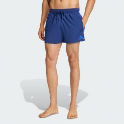 Szorty do pływania 3-Stripes 3-Inch. Niebieskie krótkie spodenki sportowe męskie Adidas, bez wzorów, z materiału, do pływania. Za 149.00 zł.