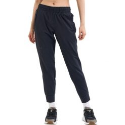 Spodnie sportowe damskie Under Armour Unstoppable Jogger. Czarne spodnie dresowe damskie Under Armour, l, bez wzorów, z dresówki, na fitness i siłownię. Za 537.00 zł.