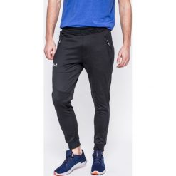 Under Armour - Spodnie Reactor Tapered. Czarne spodnie sportowe męskie Under Armour, m, bez wzorów, z dzianiny. W wyprzedaży za 239.90 zł.