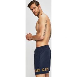 Calvin Klein Jeans - Szorty kąpielowe. Niebieskie kąpielówki męskie Calvin Klein Jeans, l, bez wzorów, z jeansu. W wyprzedaży za 229.90 zł.