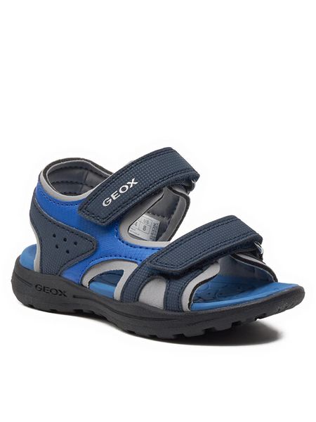 Geox Sandały J Vaniett Boy J455XC 015CE C4226 M Granatowy. Niebieskie sandały chłopięce Geox, ze skóry, bez zapięcia. Za 199.99 zł.