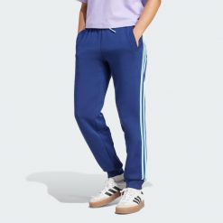 Spodnie Arsenal. Niebieskie spodnie materiałowe damskie Adidas, m, bez wzorów. Za 329.00 zł.