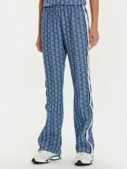 Lacoste Spodnie dresowe XF9313 Niebieski Regular Fit. Niebieskie spodnie dresowe damskie Lacoste, bez wzorów, z bawełny. Za 589.99 zł.