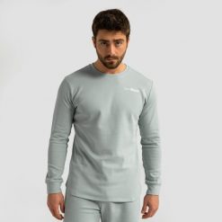 Bluza męska slim bez kaptura eukaliptusowa Limitless. Zielone bluzy męskie GYMBEAM, l, bez wzorów, z bawełny, bez kaptura, na fitness i siłownię. Za 84.90 zł.