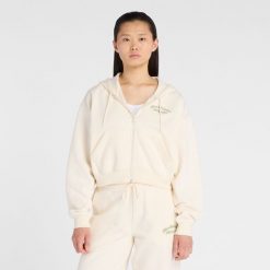 Bluza damska New Balance WJ53509PEF – beżowa. Brązowe bluzy damskie New Balance, m, bez wzorów, z bawełny, z kapturem. Za 329.99 zł.