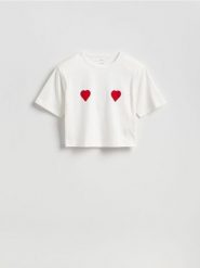 T-shirt z poduszkami na ramionach - złamana biel. T-shirty damskie Reserved, l, bez wzorów, z bawełny, bez kołnierzyka. W wyprzedaży za 25.99 zł.