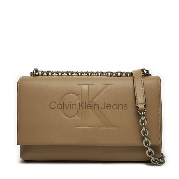 Torebka Calvin Klein Jeans. Brązowe listonoszki damskie Calvin Klein Jeans, bez wzorów, z jeansu, bez dodatków. Za 349.99 zł.