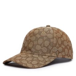 Czapka z daszkiem Coach. Brązowe czapki i kapelusze damskie Coach, bez wzorów. Za 319.99 zł.