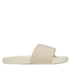 Klapki Calvin Klein Jeans. Klapki damskie Calvin Klein Jeans, bez wzorów, z jeansu, bez obcasa. Za 99.99 zł.