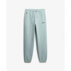 Spodnie damskie Superdry Essential. Niebieskie spodnie sportowe damskie Superdry., bez wzorów. Za 288.40 zł.