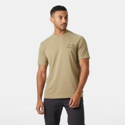 Koszulka Helly Hansen Skog Graphic. Brązowe koszulki sportowe męskie Helly Hansen, bez wzorów, bez kołnierzyka, bez ramiączek, trekkingowe. Za 239.00 zł.