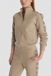 GUESS Beżowa damska bluza rozpinana z lampasami Britney, Rozmiar XS. Brązowe bluzy sportowe damskie Guess, xs, z aplikacjami, bez kaptura. Za 489.99 zł.