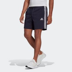 Spodenki fitness męskie Adidas. Niebieskie krótkie spodenki sportowe męskie Adidas, m, bez wzorów, z bawełny, na fitness i siłownię. Za 99.99 zł.