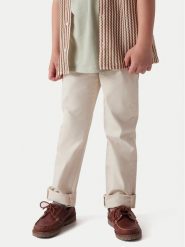 Guess Chinosy L6RB14 WFPMA Beżowy Regular Fit. Brązowe spodnie materiałowe dla chłopców Guess, z aplikacjami, z bawełny. Za 269.99 zł.