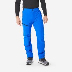 Spodnie turystyczne męskie Quechua SH900 mountain. Niebieskie spodnie materiałowe męskie QUECHUA, l, bez wzorów, z elastanu, trekkingowe. Za 279.99 zł.