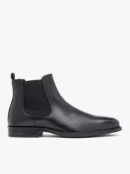 Czarne skórzane sztyblety. Czarne botki męskie Ryłko, bez wzorów, ze skóry, eleganckie, przed kolano, bez zapięcia. Za 599.99 zł.