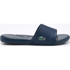 Lacoste - Klapki. Niebieskie klapki damskie Lacoste, bez wzorów, z gumy, bez obcasa, na obcasie, bez zapięcia. W wyprzedaży za 89.90 zł.
