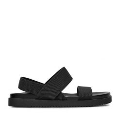 Sandały JENNY. Czarne sandały damskie Jenny, bez wzorów, bez obcasa, na płaskiej podeszwie, bez zapięcia. Za 89.99 zł.