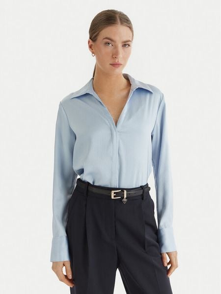 Calvin Klein Koszula LV044F129G Błękitny Regular Fit. Niebieskie bluzki damskie Calvin Klein, s, bez wzorów, z syntetyku, bez kołnierzyka, bez ramiączek. Za 343.99 zł.