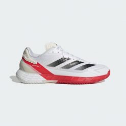 Buty Defiant Speed 2 Tennis. Białe buty sportowe męskie Adidas, z materiału, bez zapięcia, tenisowe. W wyprzedaży za 420.30 zł.