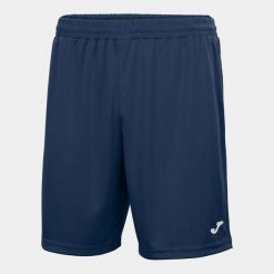 Spodenki do piłki nożnej dla chłopców Joma Nobel. Niebieskie szorty dla chłopców Joma, bez wzorów, sportowe. Za 141.99 zł.