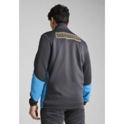 Męska rozpinana kurtka Olympique de Marseille ftblNRGY+ PUMA. Brązowe kurtki męskie Puma, m, z aplikacjami, sportowe, bez kaptura. W wyprzedaży za 359.00 zł.