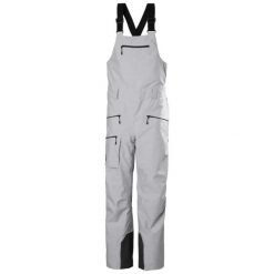 Kombinezon narciarski damski z szelkami Helly Hansen Powderqueen 2.0. Szare spodnie sportowe damskie Helly Hansen, bez wzorów, narciarskie. Za 1,178.55 zł.