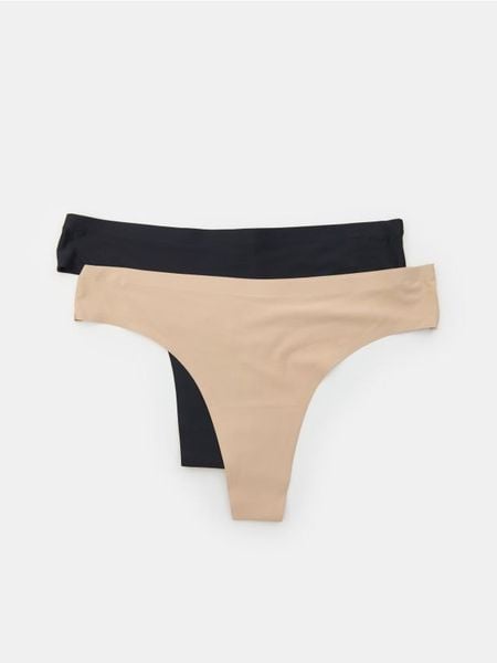 Bezszwowe majtki stringi 2 pack - kremowy. Białe stringi damskie Sinsay, l, bez wzorów. Za 12.99 zł.