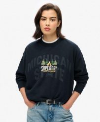 Sweter pamiątkowy podróżny luzem. Niebieskie swetry damskie Superdry., bez wzorów, z bawełny, bez kołnierzyka, bez ramiączek, bez kaptura. Za 288.10 zł.