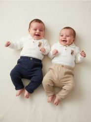 Ocieplane spodnie z ozdobnymi guzikami 2 pack - beżowy. Brązowe spodenki niemowlęce Sinsay, bez wzorów. W wyprzedaży za 11.99 zł.