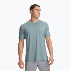 Koszulka Under Armour Vanish Energy. Niebieskie koszulki sportowe męskie Under Armour, bez wzorów, bez kołnierzyka, bez ramiączek, na fitness i siłownię. Za 219.99 zł.