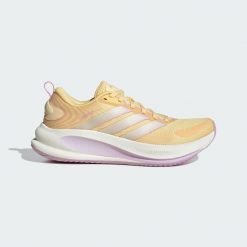 BUTY DO BIEGANIA SUPERNOVA EASE 2 W. Brązowe obuwie sportowe damskie Adidas, bez wzorów, z gumy, do biegania. Za 399.00 zł.