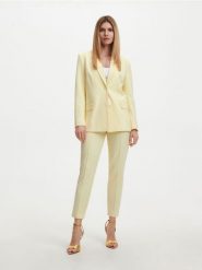 Garniturowe spodnie - żółty. Żółte spodnie materiałowe damskie Reserved, l, bez wzorów, z dzianiny. W wyprzedaży za 49.99 zł.