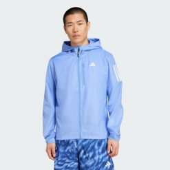 Kurtka Own The Run. Niebieskie kurtki męskie Adidas, m, bez wzorów, bez kaptura. Za 329.00 zł.