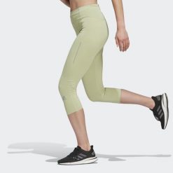Legginsy damskie adidas 3/4 Own The Run Running. Zielone legginsy damskie Adidas, s, bez wzorów, z materiału, do biegania. W wyprzedaży za 145.55 zł.