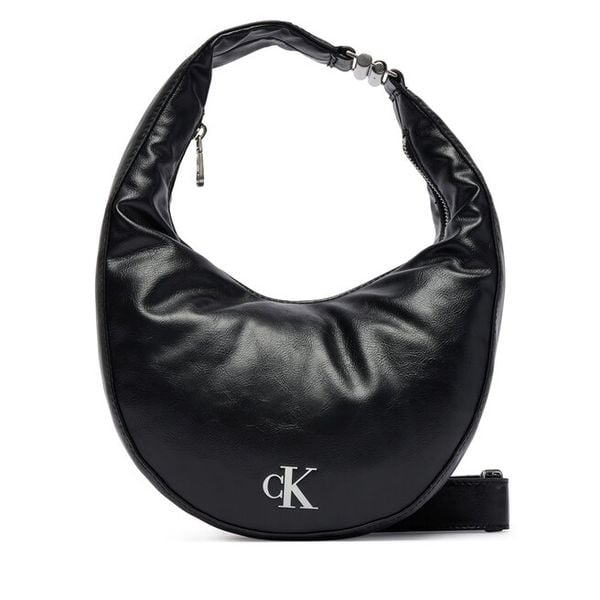 Torebka Calvin Klein. Czarne torebki do ręki damskie Calvin Klein, bez wzorów, klasyczne, bez dodatków. Za 333.99 zł.