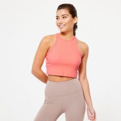 Koszulka bez rękawów damska Domyos Gym & Pilates 520 crop top. Brązowe koszulki sportowe damskie DOMYOS, l, bez wzorów, z bawełny, bez kołnierzyka, bez ramiączek, na fitness i siłownię. Za 29.99 zł.