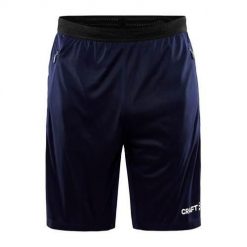 Spodenki treningowe męskie Craft Evolve Zip Pocket. Niebieskie spodnie sportowe męskie Craft, m, bez wzorów, z dresówki, casualowe. Za 239.00 zł.