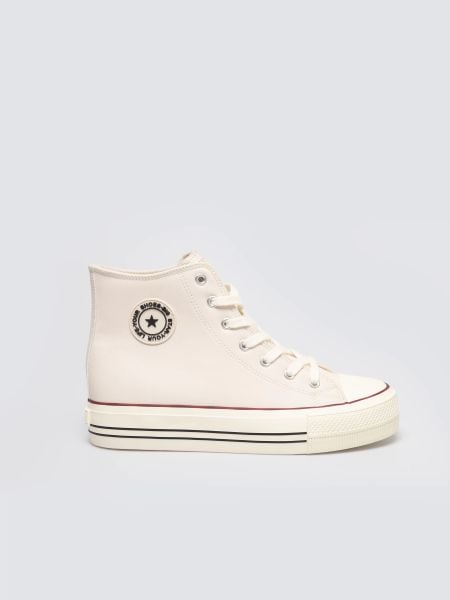 Trampki damskie wysokie ze skóry ekologicznej beżowe SS274293 801. Brązowe trampki i tenisówki damskie Big Star, bez wzorów, ze skóry ekologicznej, eleganckie, bez zapięcia. W wyprzedaży za 79.99 zł.