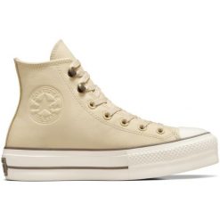 Sneakers Converse Chuck Taylor All Star Lift. Brązowe trampki i tenisówki damskie Converse, bez wzorów, ze skóry ekologicznej, retro, bez zapięcia. Za 590.00 zł.