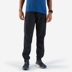 Spodnie do biegania męskie Kiprun Run 500 Light. Czarne spodnie sportowe męskie KIPRUN, l, bez wzorów, z elastanu, do biegania. Za 129.99 zł.