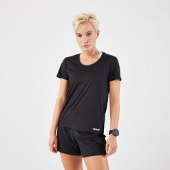 Koszulka do biegania damska Kiprun Run 100. Czarne koszulki sportowe damskie KALENJI, xl, bez wzorów, z materiału, sportowe, bez kołnierzyka. Za 24.99 zł.