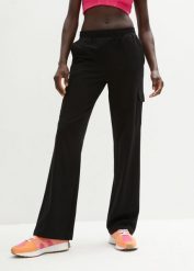 Spodnie sportowe z elastycznego materiału z bawełną. Czarne spodnie sportowe damskie bonprix, bez wzorów, z bawełny. Za 109.99 zł.
