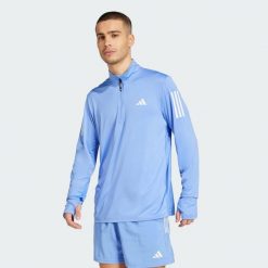 Bluza Own The Run Half-Zip. Niebieskie bluzy męskie Adidas, xl, bez wzorów, bez kaptura, do biegania. Za 219.00 zł.