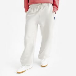 Spodnie damskie Elementals. Brązowe spodnie materiałowe damskie Decathlon, s, bez wzorów, z bawełny. Za 149.99 zł.
