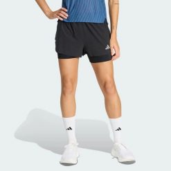 Szorty 2-w-1 z czterema kieszeniami ADI365 Climacool+. Czarne szorty sportowe damskie Adidas, l, bez wzorów, z elastanu, klasyczne, z standardowym stanem, do biegania, climacool (adidas). Za 279.00 zł.