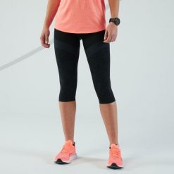 Legginsy do biegania krótkie damskie Kiprun Care. Czarne legginsy damskie KIPRUN, l, bez wzorów, z elastanu, z podwyższonym stanem, krótkie, do biegania. Za 59.99 zł.