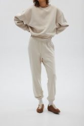 Spodnie dresowe w kolorze OAT - JOLLY-XS. Brązowe spodnie dresowe damskie Marsala, xs, bez wzorów, z bawełny. Za 249.90 zł.