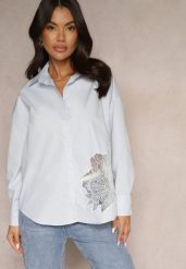 Niebieska Koszula z Bawełny Ozdobiona Ażurową Wstawką Donivessa. Niebieskie bluzki damskie Renee, l, w ażurowe wzory, z bawełny, eleganckie, bez kołnierzyka, bez ramiączek. Za 54.99 zł.
